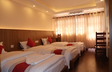 triple-bed-hotel-chhimeki